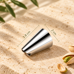 Stainless steel finger guard on a stone surface with labeled dimensions of 3.8 cm by 2cm
