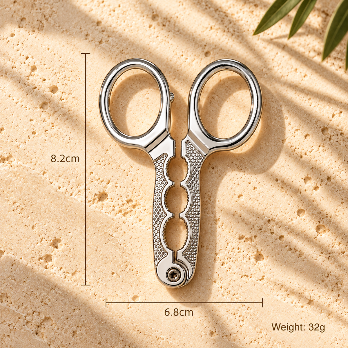 Stainless steel pistachio opener pliers measuring 8.2 × 6.8 cm and weighing 32 g